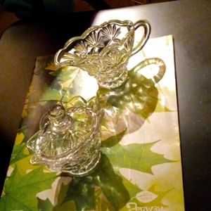 A fancy 2 piece creamer & sugar set